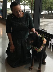 Wedding Officiant Leora Lewis with dog ring bearer at a wedding at the District Winery in DC