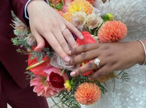 A wedding at Herrington on the Bay, MD of a bride and groom couple showing their wings 